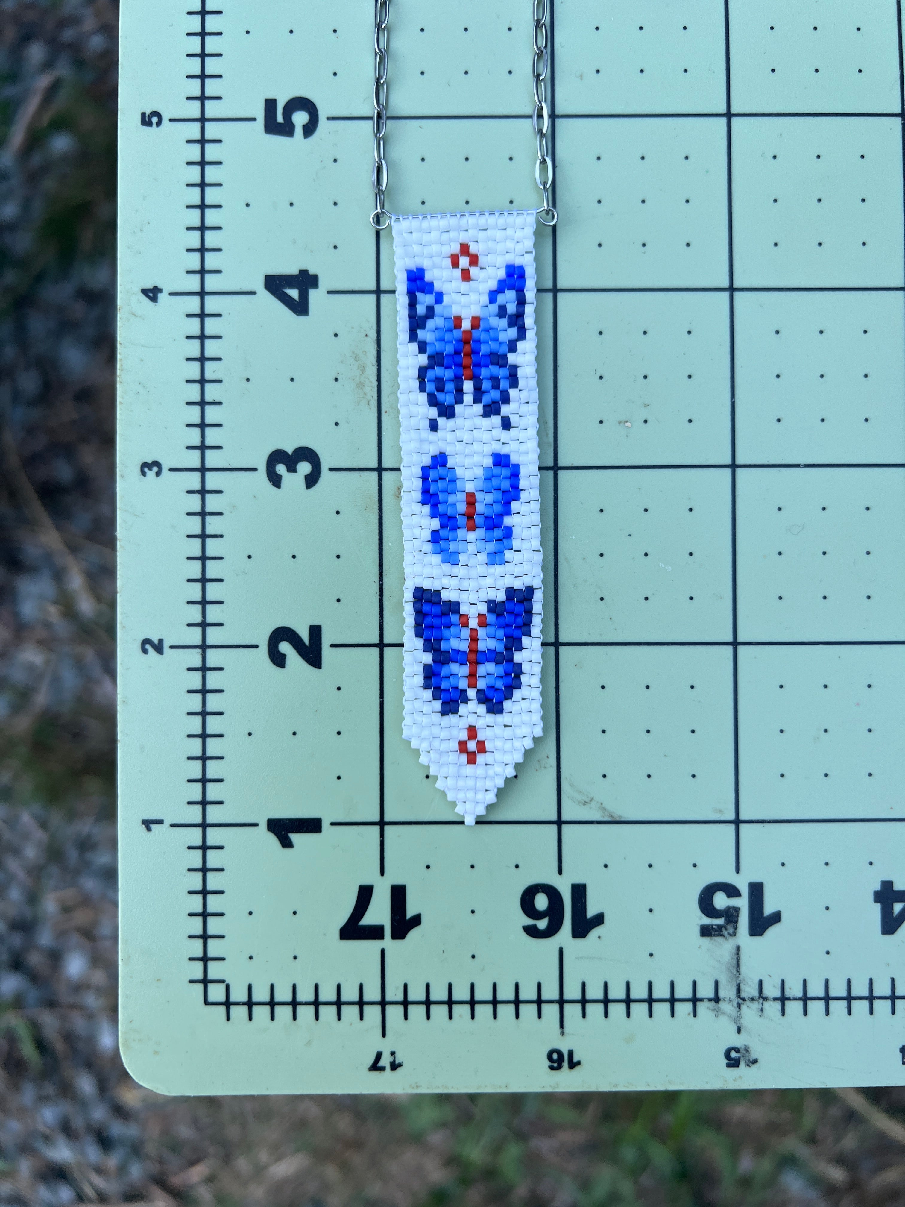 winged indigo pendant