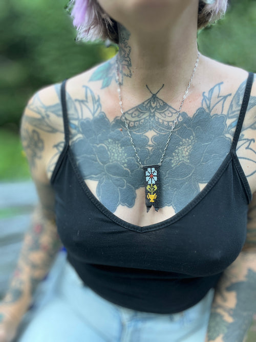 blue daisy pendant