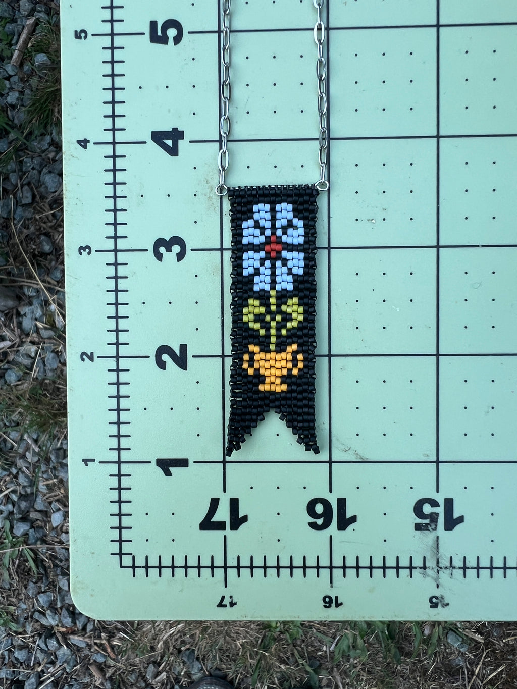 blue daisy pendant
